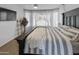 Inviting main bedroom with large windows, and decorative bed frame at 10909 W Chase Ln, Avondale, AZ 85323