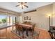Inviting dining area with sliding door access to back yard at 11553 W Cottontail Ct, Surprise, AZ 85378