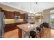 Well-equipped kitchen with stainless appliances and granite countertops at 11553 W Cottontail Ct, Surprise, AZ 85378