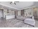 Open-concept living room with modern finishes, kitchen, and dining area at 12083 W Peak View Rd, Peoria, AZ 85383