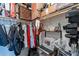 Organized closet with shelving and hanging space provides ample storage solutions at 12238 W Patrick Ct, Sun City, AZ 85373
