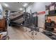 Large garage interior with ample space for vehicle and boat storage, plus custom shelving at 12238 W Patrick Ct, Sun City, AZ 85373