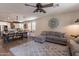 Open-concept living room with a view into the adjacent kitchen at 12238 W Patrick Ct, Sun City, AZ 85373