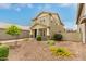 Charming home with a neatly landscaped front yard and a well-maintained exterior at 13380 N 148Th Ave, Surprise, AZ 85379