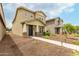 Attractive two-story home with neat landscaping, a covered entry, and a well-kept front yard at 13380 N 148Th Ave, Surprise, AZ 85379