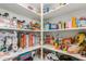 Organized walk-in pantry with ample storage shelves for food and supplies at 13380 N 148Th Ave, Surprise, AZ 85379