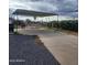 Large carport and driveway area, featuring plenty of parking at 138 E Monte Way, Phoenix, AZ 85042