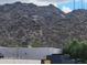 A view of the property exterior with a mountain in the background at 138 E Monte Way, Phoenix, AZ 85042