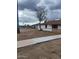 A view of the home's front exterior, highlighting its clean facade and freshly landscaped front yard at 138 E Monte Way, Phoenix, AZ 85042