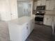 Bright kitchen with stainless steel appliances and a kitchen island at 138 E Monte Way, Phoenix, AZ 85042