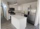 Modern kitchen featuring stainless steel appliances and white cabinets at 138 E Monte Way, Phoenix, AZ 85042