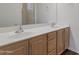 Bathroom with double sink vanity, providing ample space and storage at 15240 N 142Nd Ave # 2171, Surprise, AZ 85379