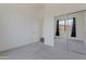 Bright bedroom with mirrored closet doors and neutral carpet creates a relaxing atmosphere at 15240 N 142Nd Ave # 2171, Surprise, AZ 85379