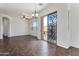 Bright living room with ceramic floors, ceiling fan, natural light, and sliding glass door access at 15240 N 142Nd Ave # 2171, Surprise, AZ 85379