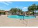 Community pool with seating and landscaped areas, perfect for residents to enjoy at 15240 N 142Nd Ave # 2171, Surprise, AZ 85379