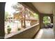 View of the outdoor community pool and balcony with chairs offering a relaxing outdoor experience at 15252 N 100Th St # 1172, Scottsdale, AZ 85260