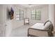 Bedroom featuring two large windows, a small mirror, and a trundle bed at 15252 N 100Th St # 1172, Scottsdale, AZ 85260