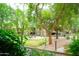 Well maintained grounds with mature trees, green grass, and bushes in a tranquil community at 15252 N 100Th St # 1172, Scottsdale, AZ 85260