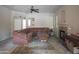 Comfortable living room with a leather sectional, ceiling fan and neutral walls that enhance a cozy feel at 15252 N 100Th St # 1172, Scottsdale, AZ 85260