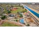 Aerial view of community park featuring baseball fields, basketball courts, volleyball courts, playgrounds, and walking paths at 15252 N 100Th St # 1172, Scottsdale, AZ 85260