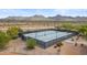 Community pickleball courts with mountain views and desert landscaping provide residents an opportunity to enjoy an active lifestyle at 15252 N 100Th St # 1172, Scottsdale, AZ 85260