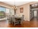 Bright dining area with stylish chandelier and view of sliding glass patio doors at 15416 W Valentine St, Surprise, AZ 85379