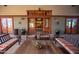 Relaxing lounge area with cozy seating, wood accents, and access to outdoor amenities at 15416 W Valentine St, Surprise, AZ 85379