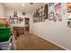 Office features carpet, memorabilia, and plenty of space for work or hobbies at 15416 W Valentine St, Surprise, AZ 85379