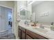 Bathroom featuring double sinks and bathtub/shower combo at 15848 W Calavar Rd, Surprise, AZ 85379