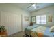 Neutral toned bedroom with large closet at 15848 W Calavar Rd, Surprise, AZ 85379