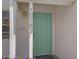 Close-up of the front door featuring an interesting door and the house number at 1618 W Vernon Ave, Phoenix, AZ 85007