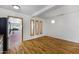Bright living room with wood flooring and unique window accents at 1618 W Vernon Ave, Phoenix, AZ 85007