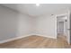 Bedroom has wood floors, neutral paint, and an open doorway to the rest of the home at 1624 E Campbell Ave # 51, Phoenix, AZ 85016