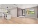 Spacious living room with an open floor plan, seamlessly connecting to the modern kitchen and dining area at 1624 E Campbell Ave # 51, Phoenix, AZ 85016