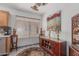 Cozy dining area near the kitchen with decorative accents, a large window, and ample space for a buffet at 16654 N 19Th Pl, Phoenix, AZ 85022