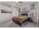 Comfortable main bedroom with stylish decor and vaulted ceilings, filled with natural light at 16654 N 19Th Pl, Phoenix, AZ 85022