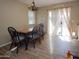 Cozy dining area with backyard access and plenty of natural light at 17128 N Princess Pl, Surprise, AZ 85374