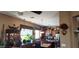 Bright kitchen with stainless steel appliances, granite countertops, and ample cabinet space at 18177 W Tasha Dr, Surprise, AZ 85388