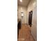 The laundry room offers tiled floors and modern appliances, with decor adding a stylish, functional space at 18177 W Tasha Dr, Surprise, AZ 85388