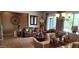 Spacious living room featuring comfortable seating, stylish decor, and an open layout at 18177 W Tasha Dr, Surprise, AZ 85388