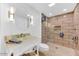 Updated bathroom with tiled walk-in shower, modern fixtures, and vanity at 19018 N Concho Cir, Sun City, AZ 85373