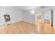Bedroom featuring hardwood floors, natural light, and an en-suite bathroom at 19018 N Concho Cir, Sun City, AZ 85373