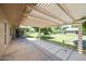 Relaxing covered patio space with pergola, offering ample shade and outdoor enjoyment at 19018 N Concho Cir, Sun City, AZ 85373