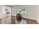 Bright living room featuring hardwood floors and backyard views at 19018 N Concho Cir, Sun City, AZ 85373