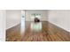 Open living room with wood flooring and a view of the neighborhood at 19018 N Concho Cir, Sun City, AZ 85373