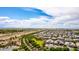 Desirable neighborhood homes taken from above, featuring manicured lawns and a safe community at 20256 E Canary Ct, Queen Creek, AZ 85142