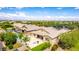 Spacious backyard featuring a pool, patio, and lush landscaping, perfect for outdoor living and entertaining at 20256 E Canary Ct, Queen Creek, AZ 85142