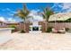Beautiful backyard with a fireplace, outdoor kitchen, and patio furniture at 20256 E Canary Ct, Queen Creek, AZ 85142