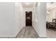 Entryway with wood-look floors and a view into the dining room at 20256 E Canary Ct, Queen Creek, AZ 85142