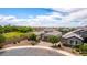 Beautiful home with well-manicured landscaping and a paver driveway, nestled in a quiet neighborhood at 20256 E Canary Ct, Queen Creek, AZ 85142